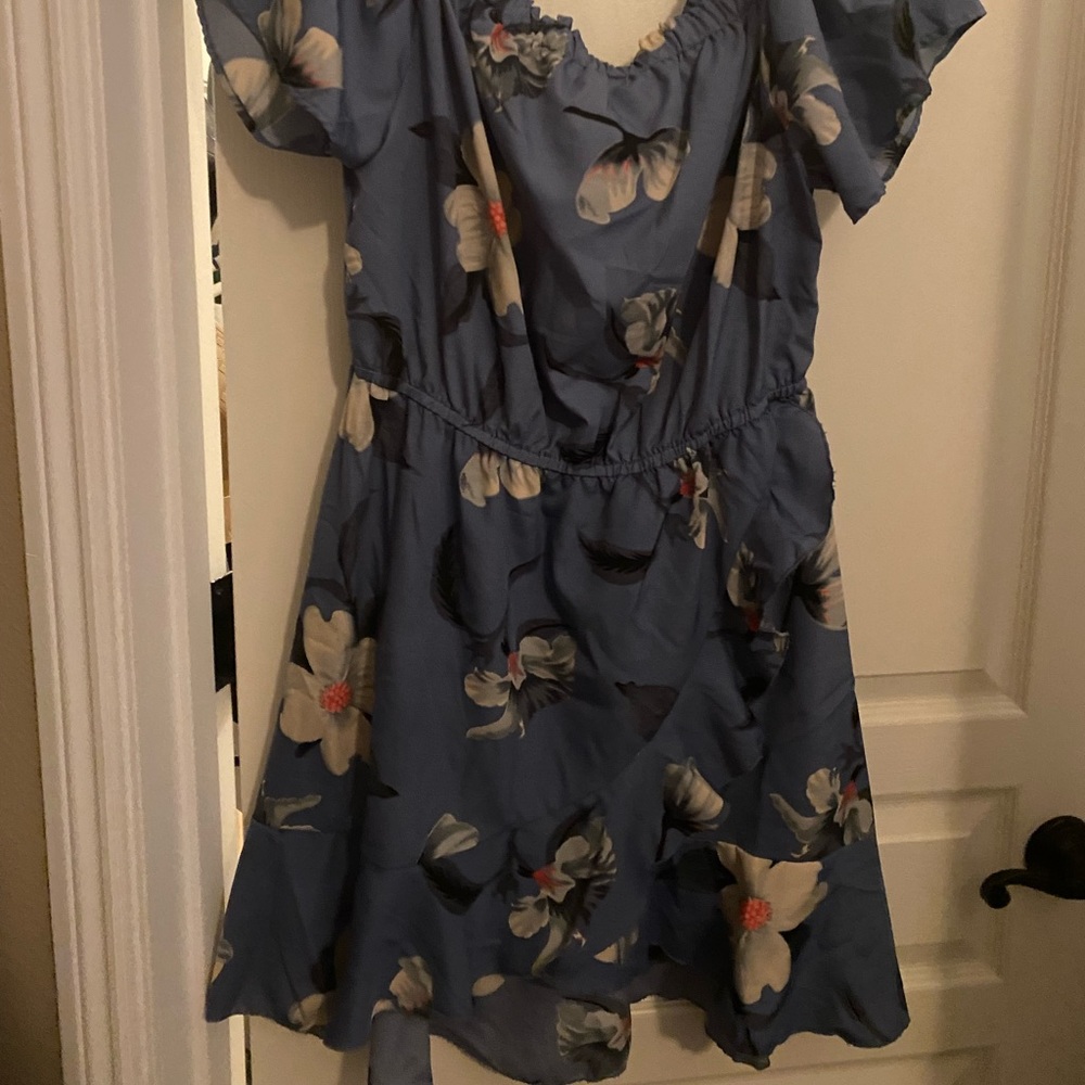 Very flattering off the shoulder wrap dress.
